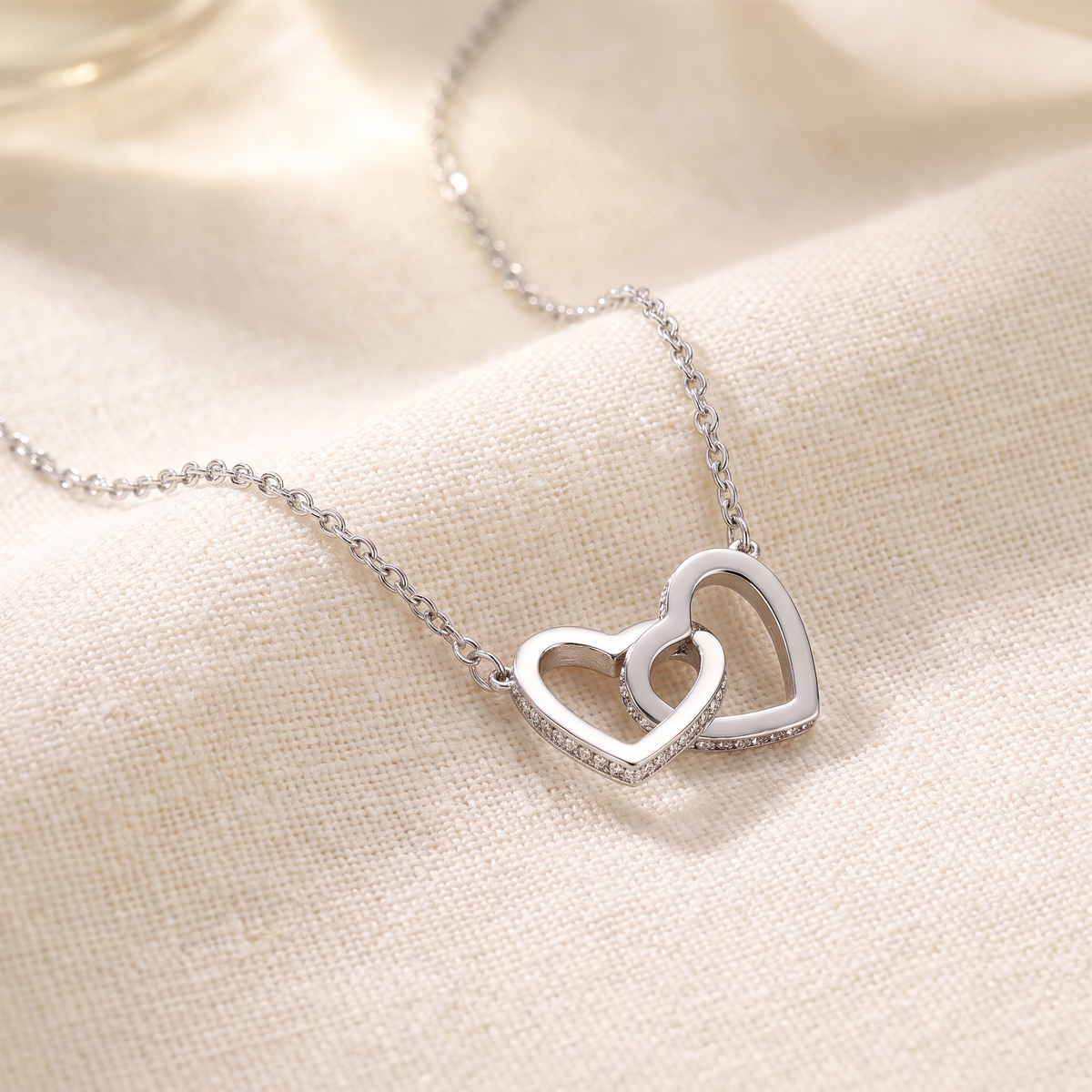 Silver interlocking hearts necklace