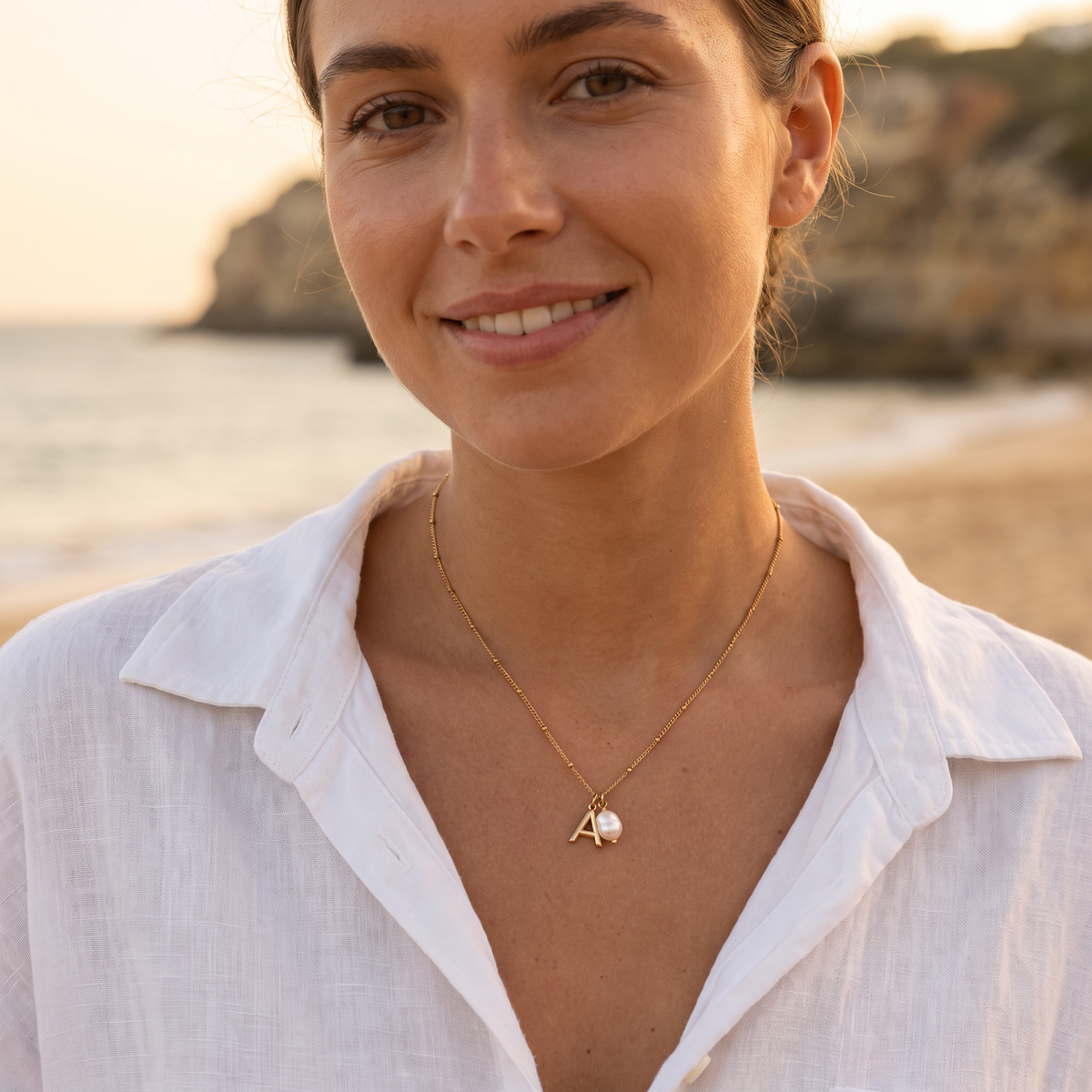 Initial necklace at the beach