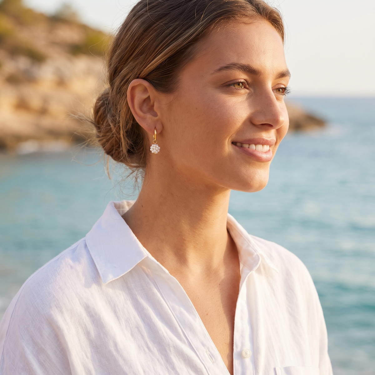 Pearl drop earrings at the beach