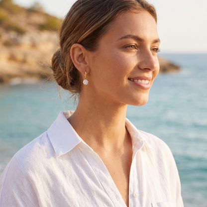 Pearl drop earrings at the beach
